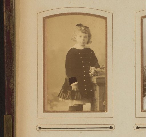 Portrait of a girl, standing by a pillar