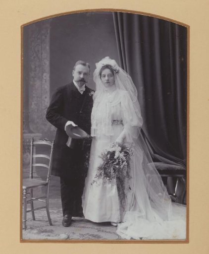 Portrait of a Bridal Couple in Wedding Attire