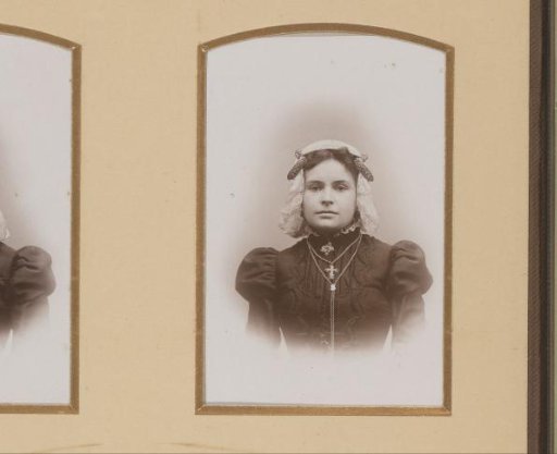 Portrait of a Young Woman in a White Traditional Cap