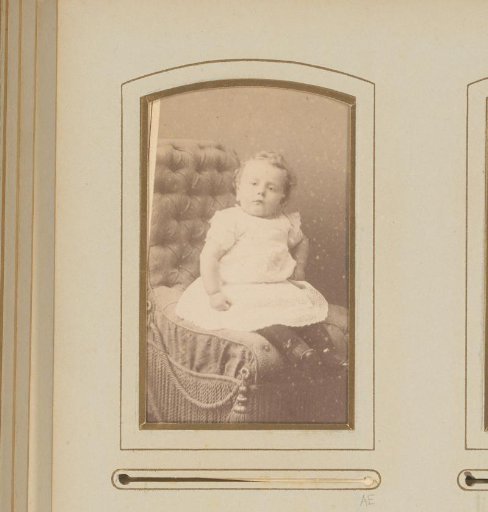 Portrait of a Seated Girl in a White Dress