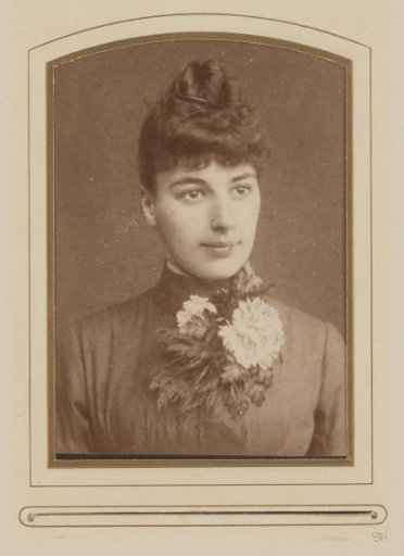 Portrait of a young woman in a floral dress