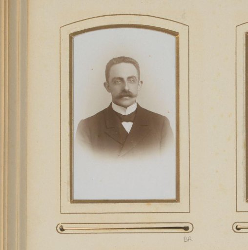 Portrait of a man with a mustache and bow tie