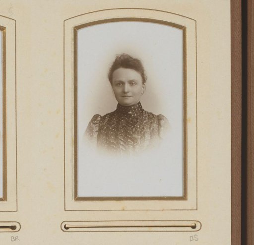Portrait of a woman in a high-collared dress