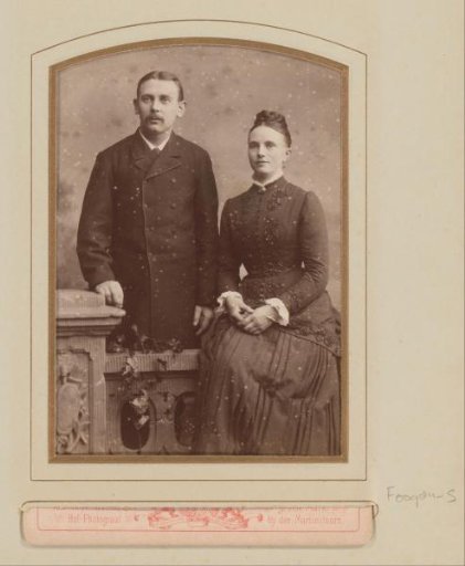 Portrait of a seated woman on a balustrade and a standing man behind a balustrade