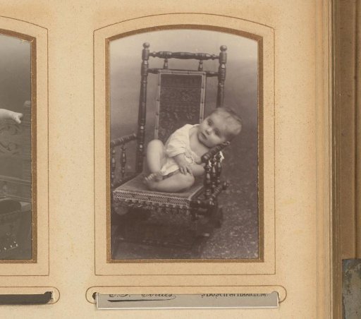 Portrait of a Child Sitting in a Chair