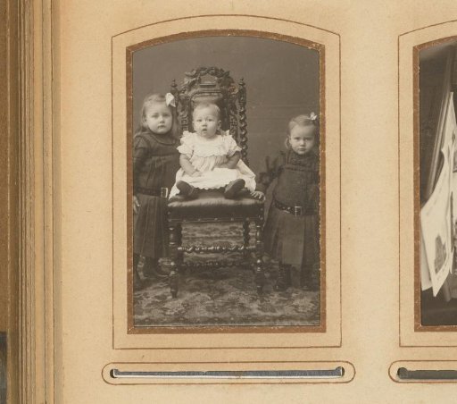 Group Portrait with Two Girls and a Baby