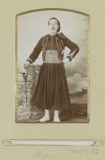 Portrait of a French Zouave, standing with a sabre