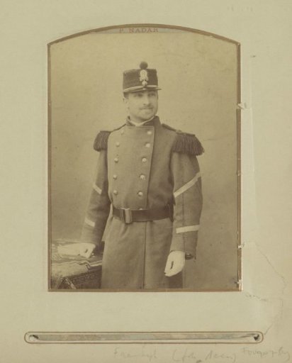 Portrait of a (possibly) French soldier, standing in a uniform jacket with a cap