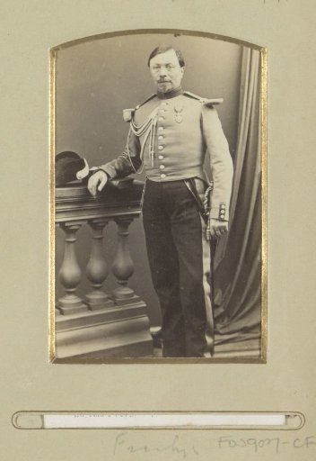 Portrait of a (possibly) French soldier, standing with a hat and decoration