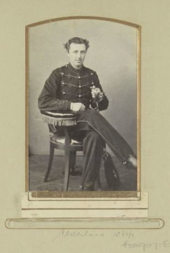 Portrait of a Hussar of the 1st Regiment of Hussars, seated with a sabre