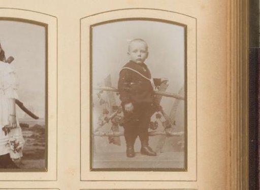 Portrait of a standing boy in a sailor suit