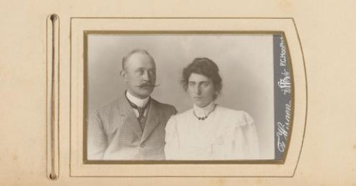 Portrait of a man with a moustache and a woman with her hair up
