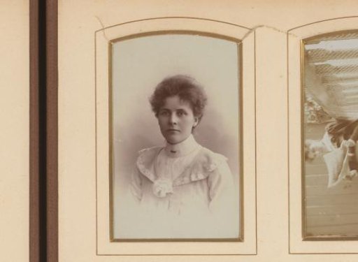 Portrait of a young woman in a white dress