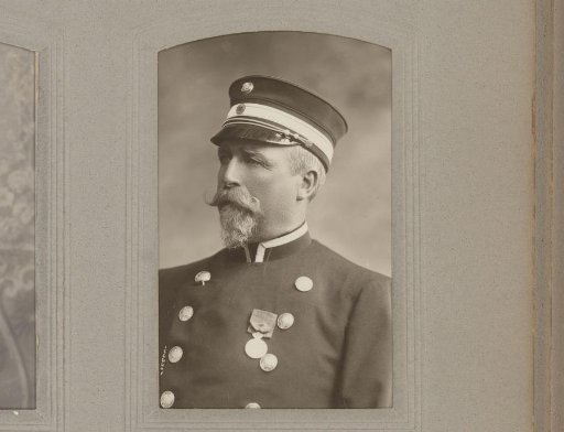 Portrait of a man in uniform with a cap