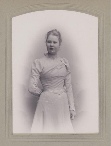 Portrait of a standing young woman