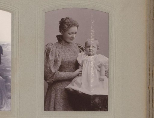 Portrait of a Standing Woman and a Seated Child
