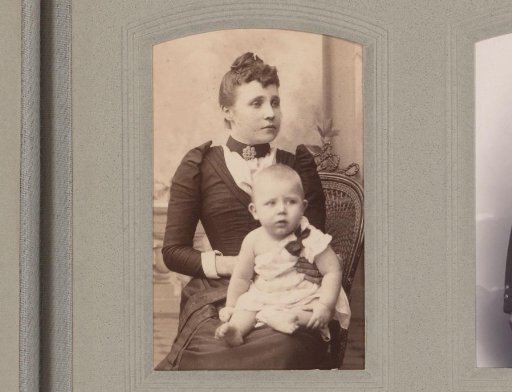 Portrait of a Seated Woman with a Baby on Her Lap