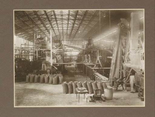 Centrifuge house and sacks in the Goedo sugar factory in Djombang, Java