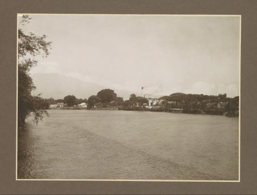 View from the Brantas Bridge of the village and Meritjan sugar factory in Kediri, Java