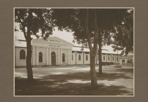 Factory building with the entrance to the laboratory of the Meritjan sugar factory in Kediri, Java