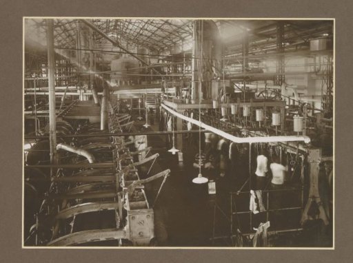 Nurses and patients in the centrifuge house of the Ngandjoek sugar factory on Java