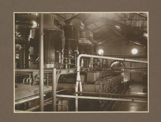 Workers in the boiling house of the Boedoeran sugar factory in Sidoarjo, Java