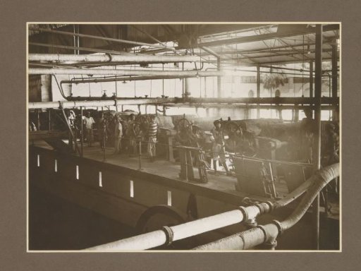 Workers in the filtering station of the Boedoeran sugar factory in Sidoarjo, Java