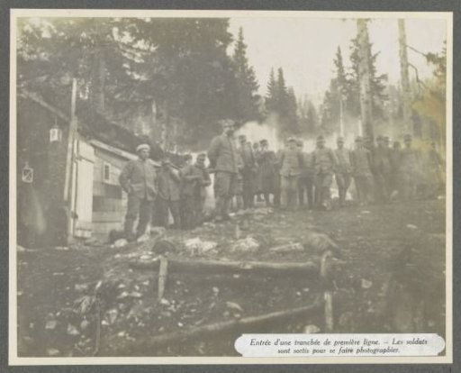 Alpine hunters posing by a trench at the front in the Dolomites, presumably Italians