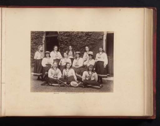 Group portrait with twelve young women from the cricket team of the Halliwick School for Girls