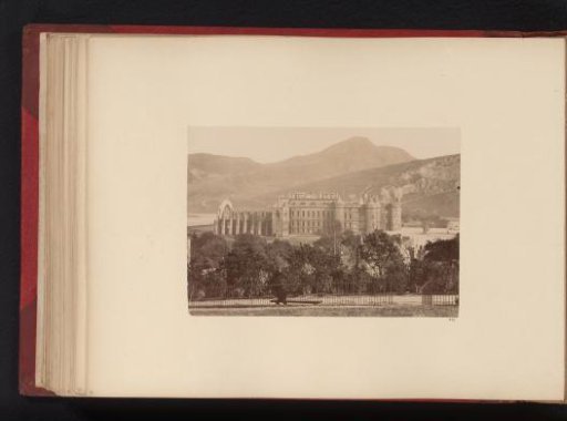 View of a castle with a burnt church, probably in Scotland