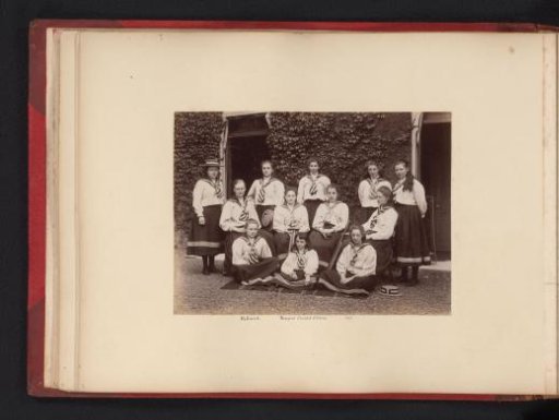 Group portrait with twelve young women from the cricket team of the Halliwick School for Girls