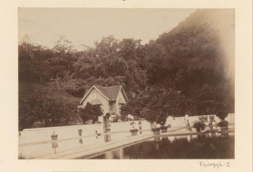 House with drinking water basins in Port of Spain