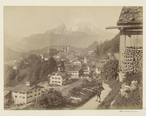 View of Berchtesgaden with a man on a path in the foreground