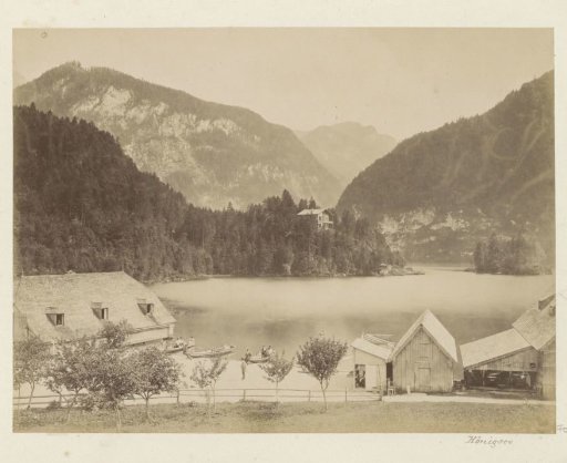 View of the Königssee in Bavaria with boats and houses in the foreground