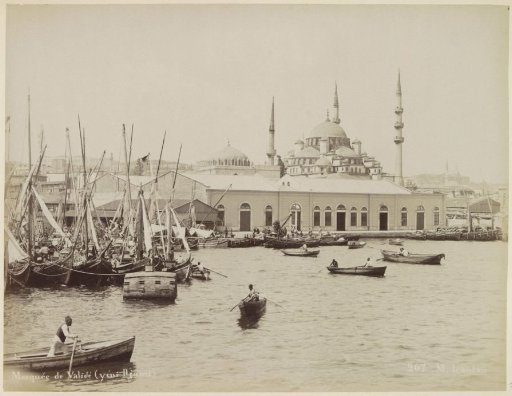 View of the Yeni Valide Mosque in Istanbul, with boats in the foreground