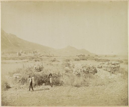 Mountain landscape with farmers and ruins near Ephesus