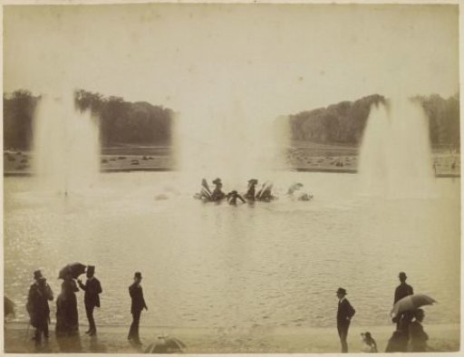 Group of statues in the Bassin d'Apollon in the park of Versailles