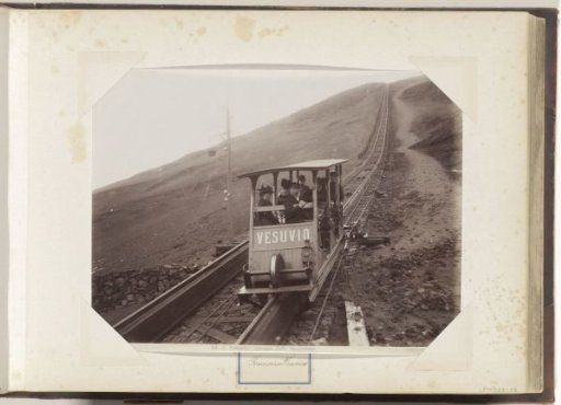Men and women in a carriage of the cable car on Vesuvius