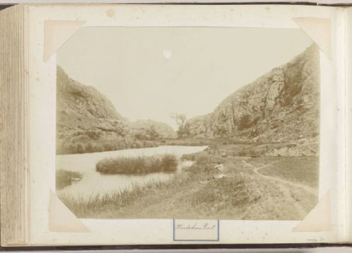 Men with a tripod at the creek of Wonderboom Poort in South Africa