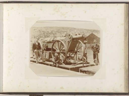 Men with a repaired cannon in South Africa