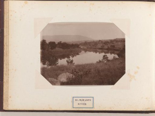 View of the Little Olifants River with a fisherman on the bank