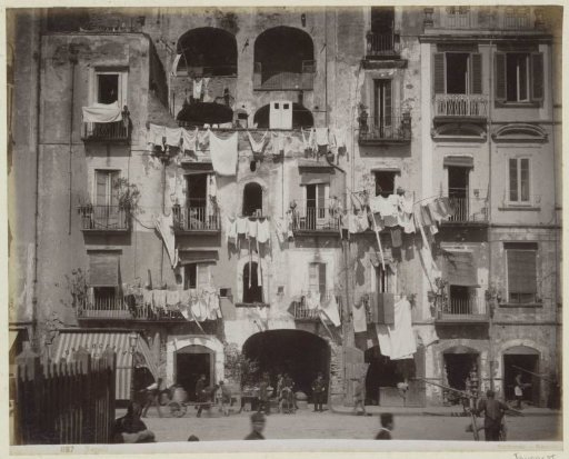 Facades with drying laundry in Naples