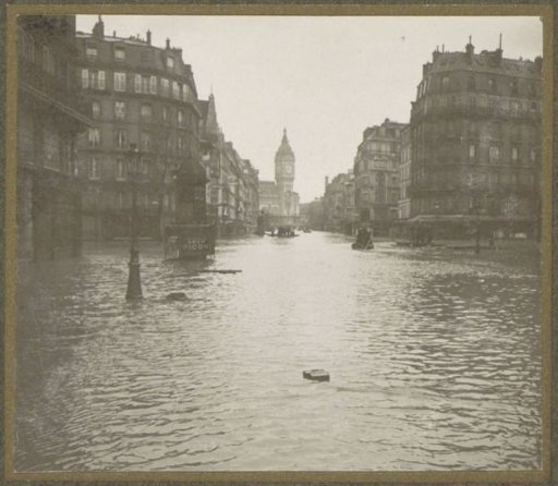 Flooded street in Paris, in the background the Tour de l'Horloge