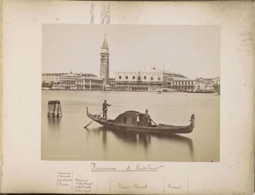 View of the Doge's Palace, the Campanile and surrounding buildings in Venice with a gondola in the foreground