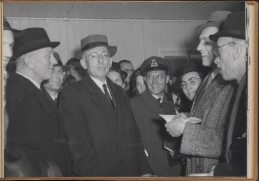 Hans Martin among smiling men