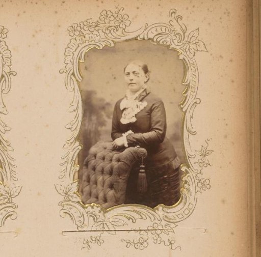 Portrait of a woman leaning on a chair