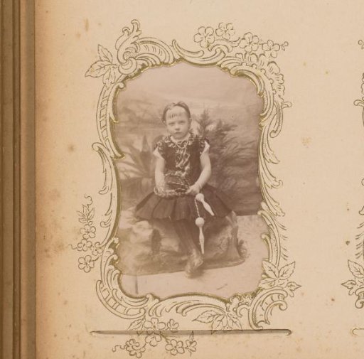 Portrait of a girl sitting with a skipping rope