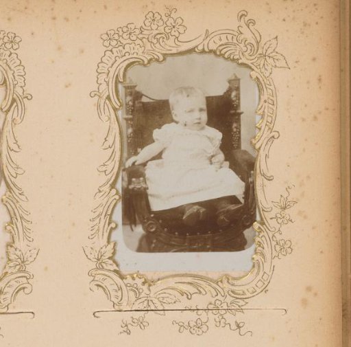 Portrait of a Child Sitting in a Chair