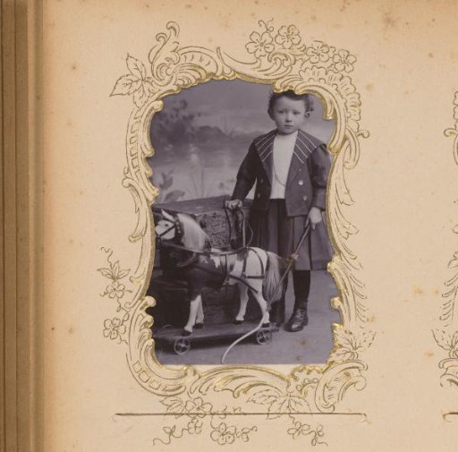 Portrait of a Boy with a Toy Horse