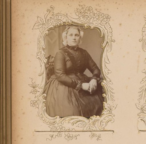 Portrait of a Seated Woman with a Traditional Cap